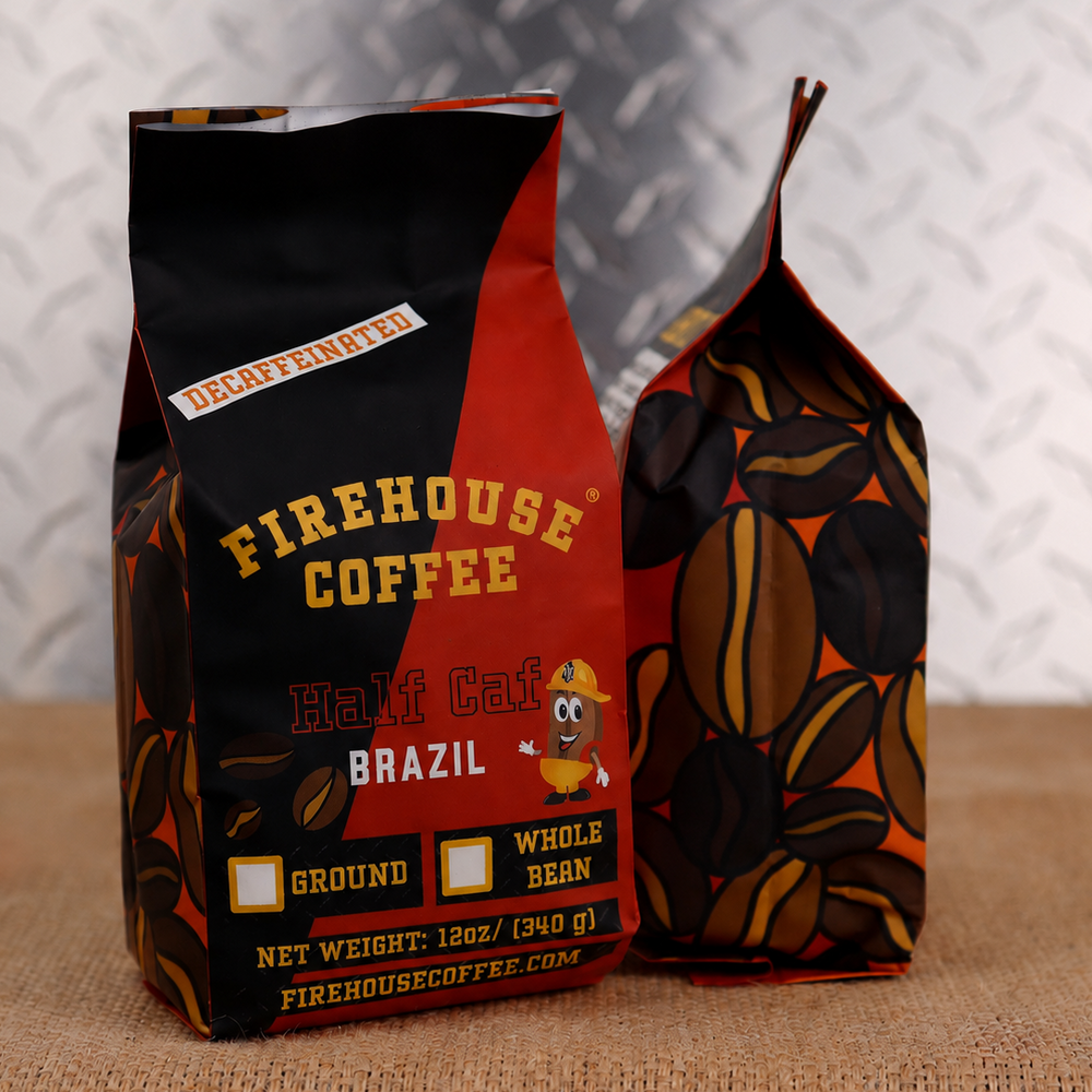 Firehouse Coffee Half Caf Brazil coffee in a 12 oz bag featuring a bold red and black design with a firefighter coffee bean mascot. This half-caffeinated Brazilian medium roast is available in whole bean or ground and offers smooth, balanced flavor with half the caffeine for a rich coffee experience any time of day.