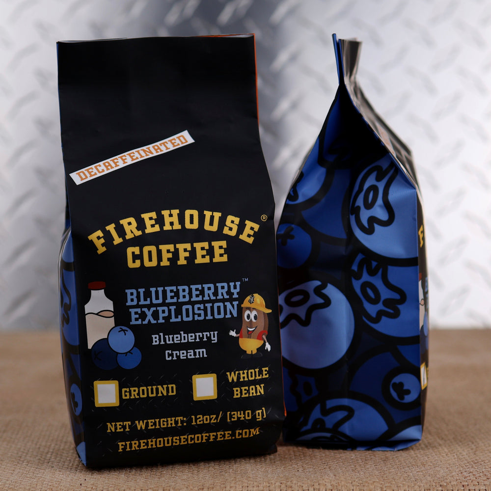 Firehouse Coffee Blueberry Explosion™ Decaf Blueberry Cream flavored coffee in a 12 oz bag featuring sweet blueberry and creamy vanilla flavor. Freshly roasted gourmet decaffeinated coffee available in whole bean or ground for a smooth, dessert-inspired coffee experience.