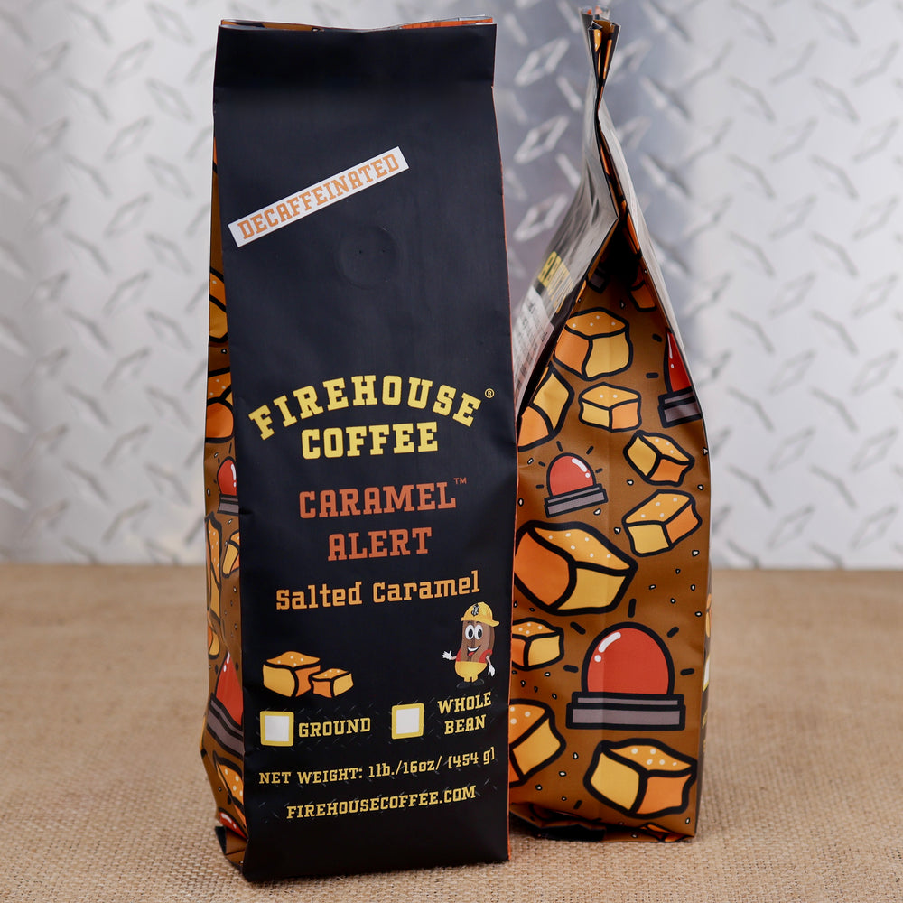 Firehouse Coffee Caramel Alert decaf salted caramel flavored coffee in a 1 lb bag with caramel candy and red alarm light illustrations.