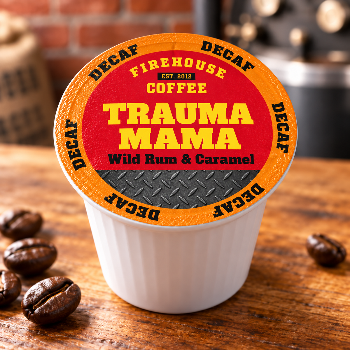 Firehouse Coffee Trauma Mama Wild Rum & Caramel decaf K-Cup with an orange DECAF rim on a wooden counter.