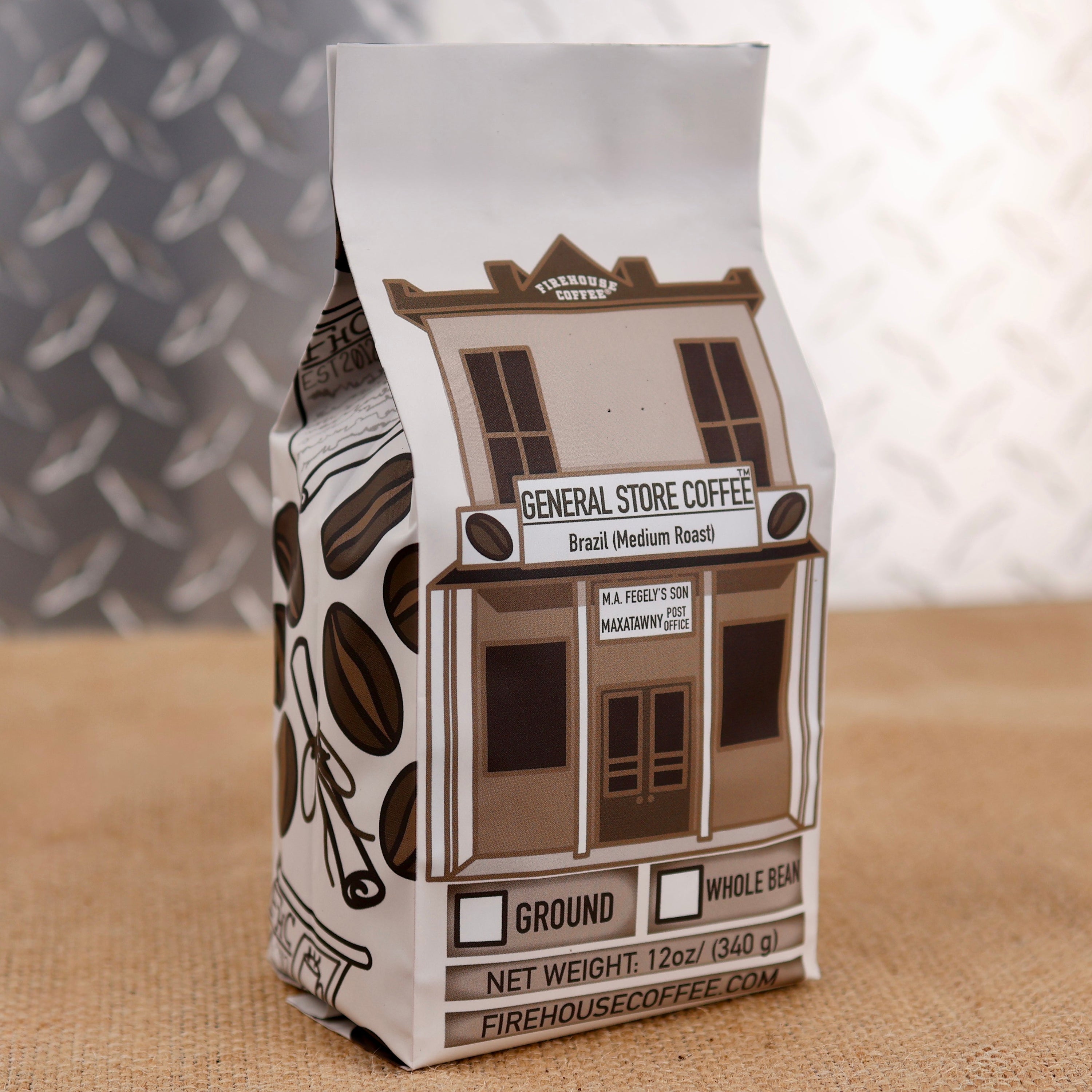 General Store Coffee Brazil Medium Roast by Firehouse Coffee featuring artwork of the historic General Store and Post Office that now houses the Firehouse Coffee roastery