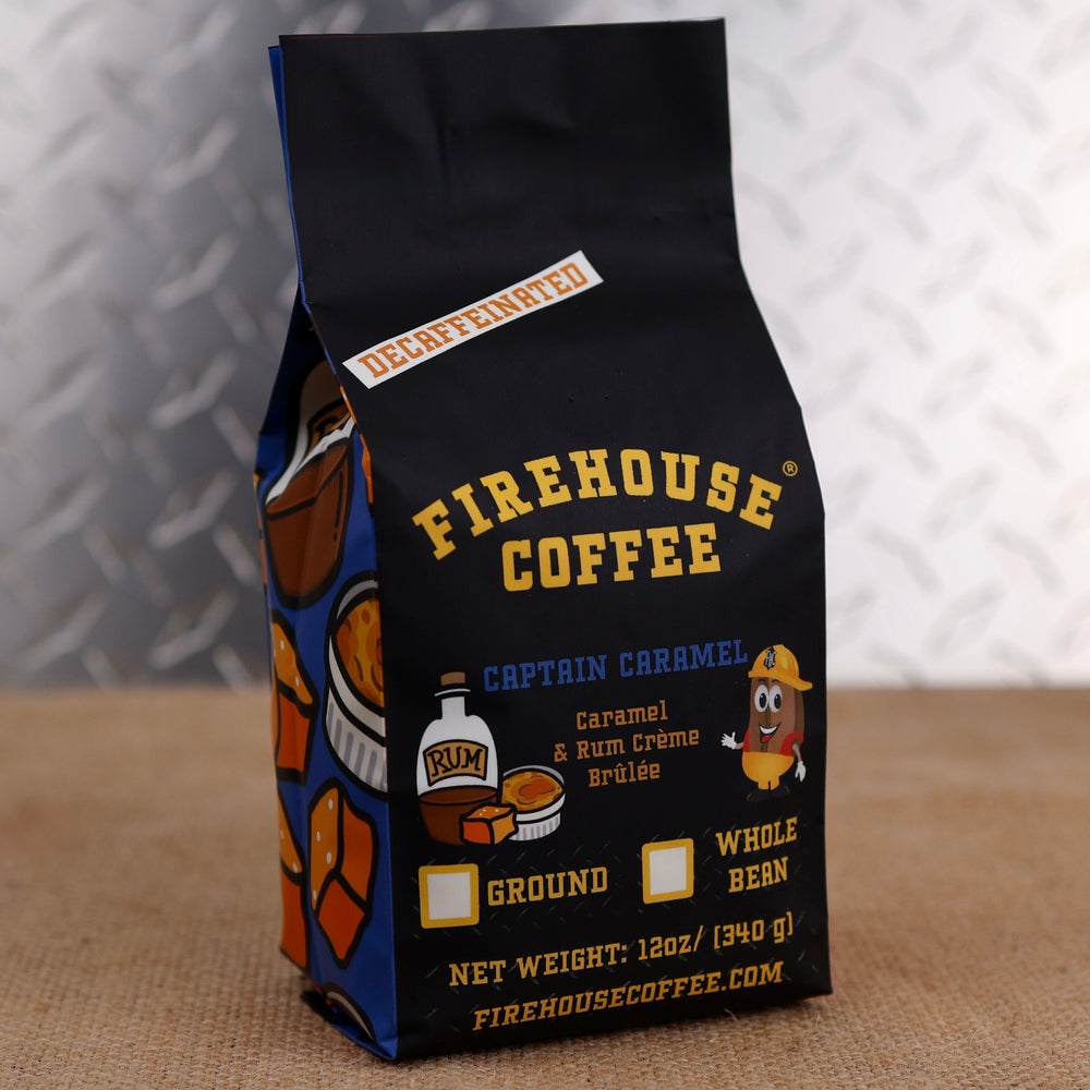Firehouse Coffee Captain Caramel™ Decaf Caramel & Rum Crème Brûlée flavored coffee in a 12 oz bag featuring buttery caramel, rum crème brûlée-inspired flavor, and creamy vanilla custard notes. Freshly roasted gourmet decaffeinated coffee available in whole bean or ground.