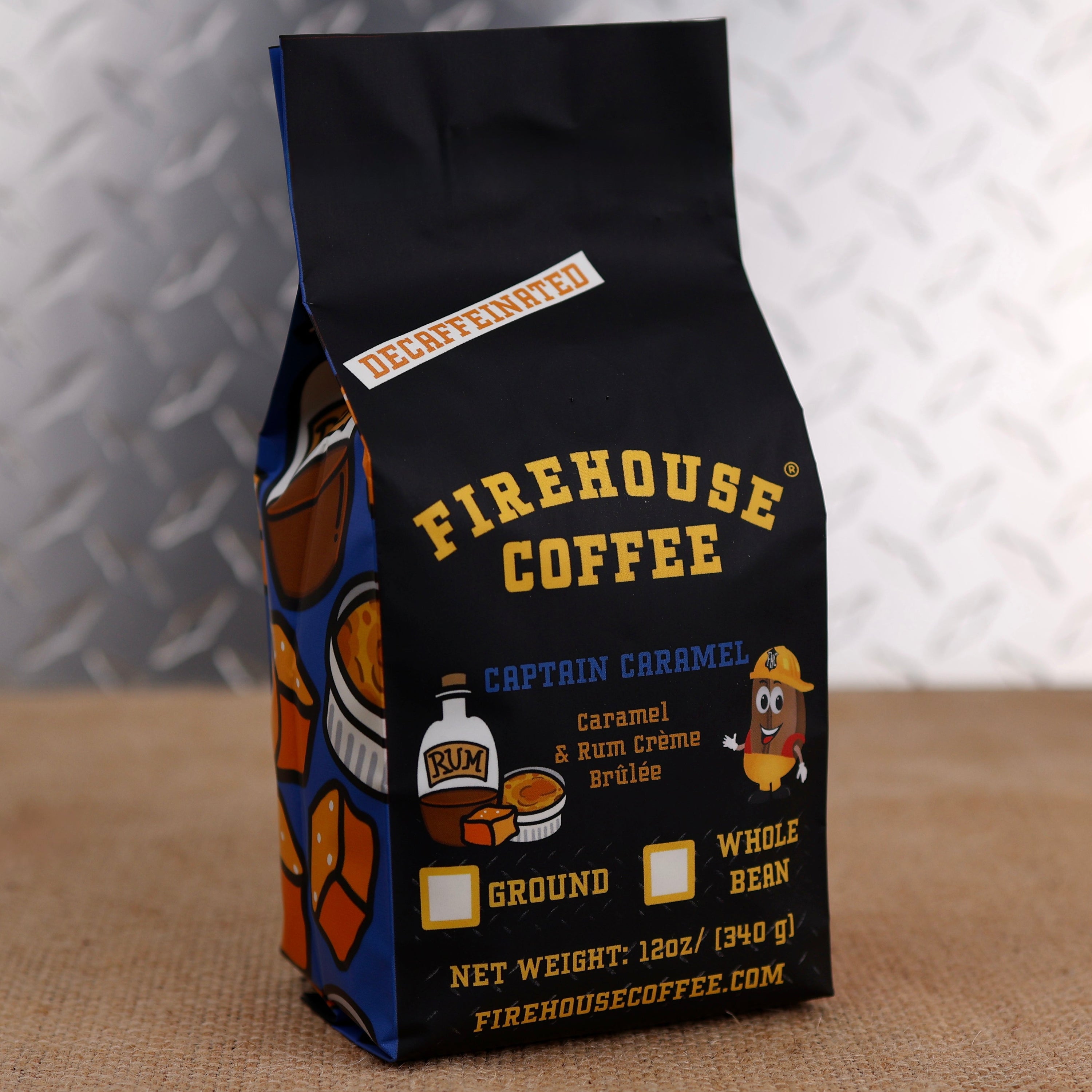 Firehouse Coffee Captain Caramel™ Decaf Caramel & Rum Crème Brûlée flavored coffee in a 12 oz bag featuring buttery caramel, rum crème brûlée-inspired flavor, and creamy vanilla custard notes. Freshly roasted gourmet decaffeinated coffee available in whole bean or ground.