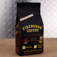 12 oz bag of Firehouse Coffee PB Palpitations Decaf Chocolate Peanut Butter Coffee, featuring Swiss Water Process decaf coffee with smooth chocolate and roasted peanut butter flavor. Fresh roasted, available in whole bean or ground.