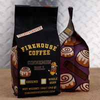 Firehouse Coffee Decaf Cinnamon Roll Flavored Coffee 12oz bag, Swiss Water Process decaffeinated premium Arabica coffee with warm cinnamon, brown sugar, buttery pastry, and vanilla icing flavors, freshly roasted.