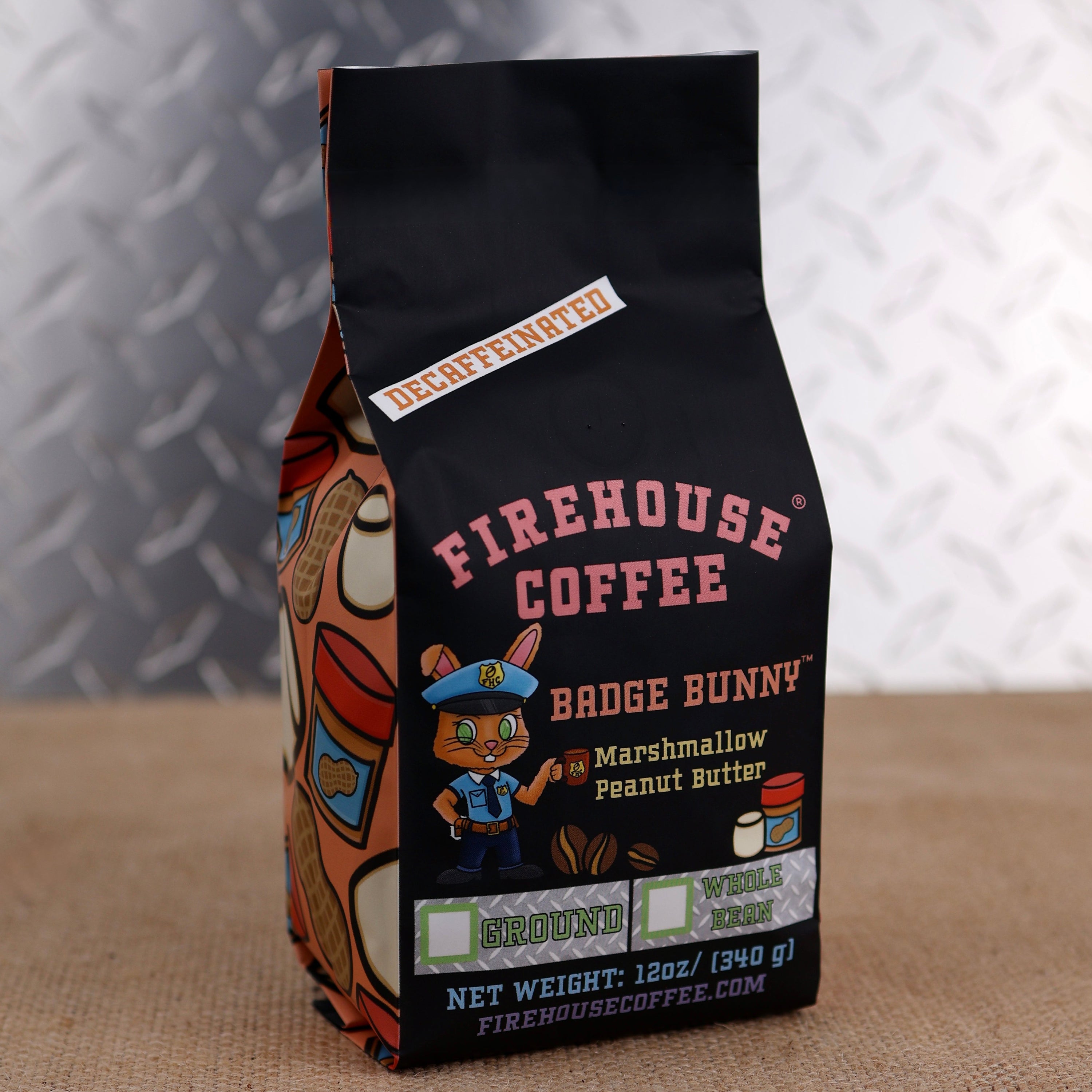 Firehouse Coffee Badge Bunny Decaf Marshmallow Peanut Butter Flavored Coffee in a 12 oz bag, made with Swiss Water Process decaffeinated coffee and infused with creamy peanut butter and fluffy marshmallow flavors. Fresh roasted and available in whole bean or ground with firefighter-themed packaging.