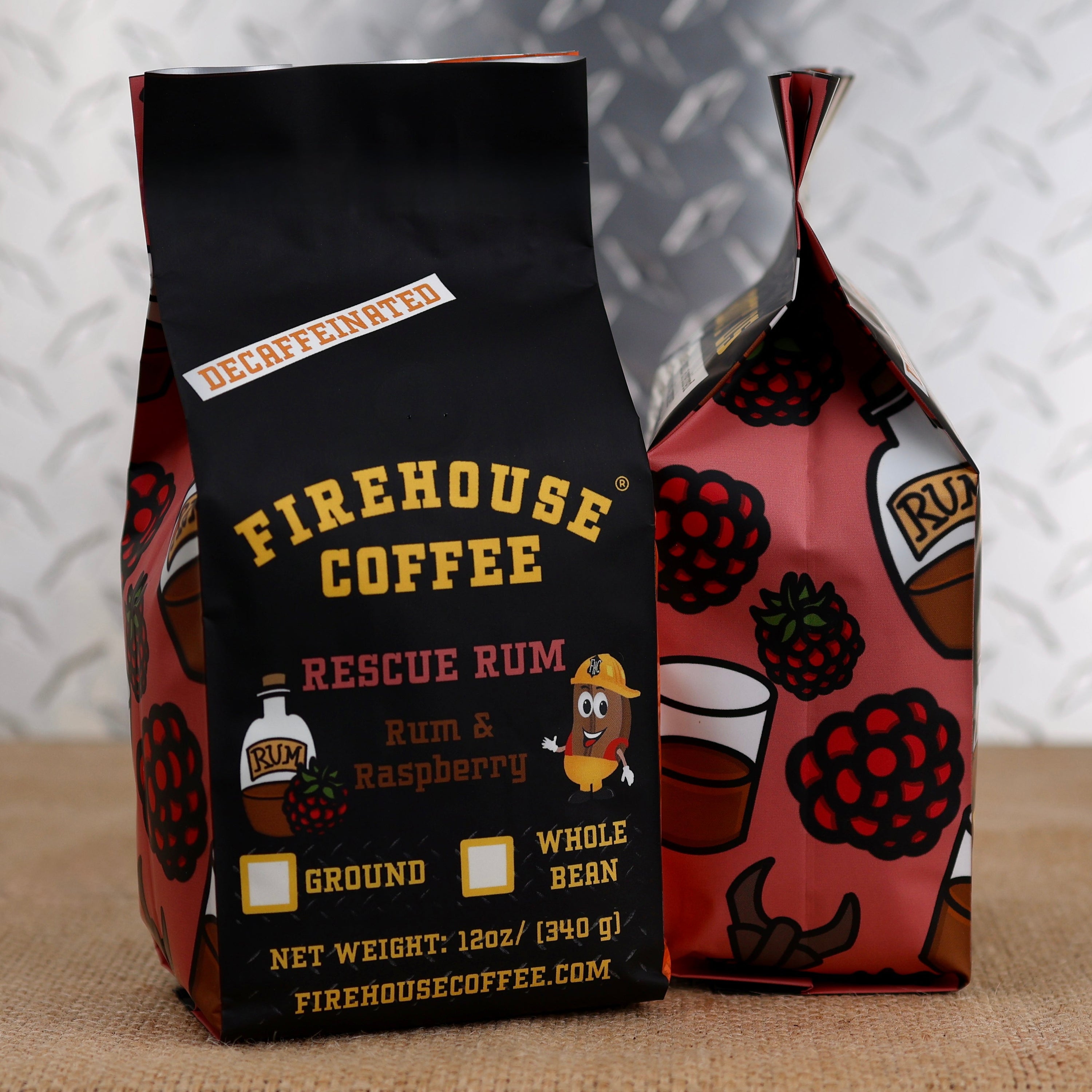Firehouse Coffee Decaf Rescue Rum Flavored Coffee 12oz bag featuring dark Jamaican rum and raspberry flavors, Swiss Water Process decaffeinated premium Arabica coffee, freshly roasted in small batches.