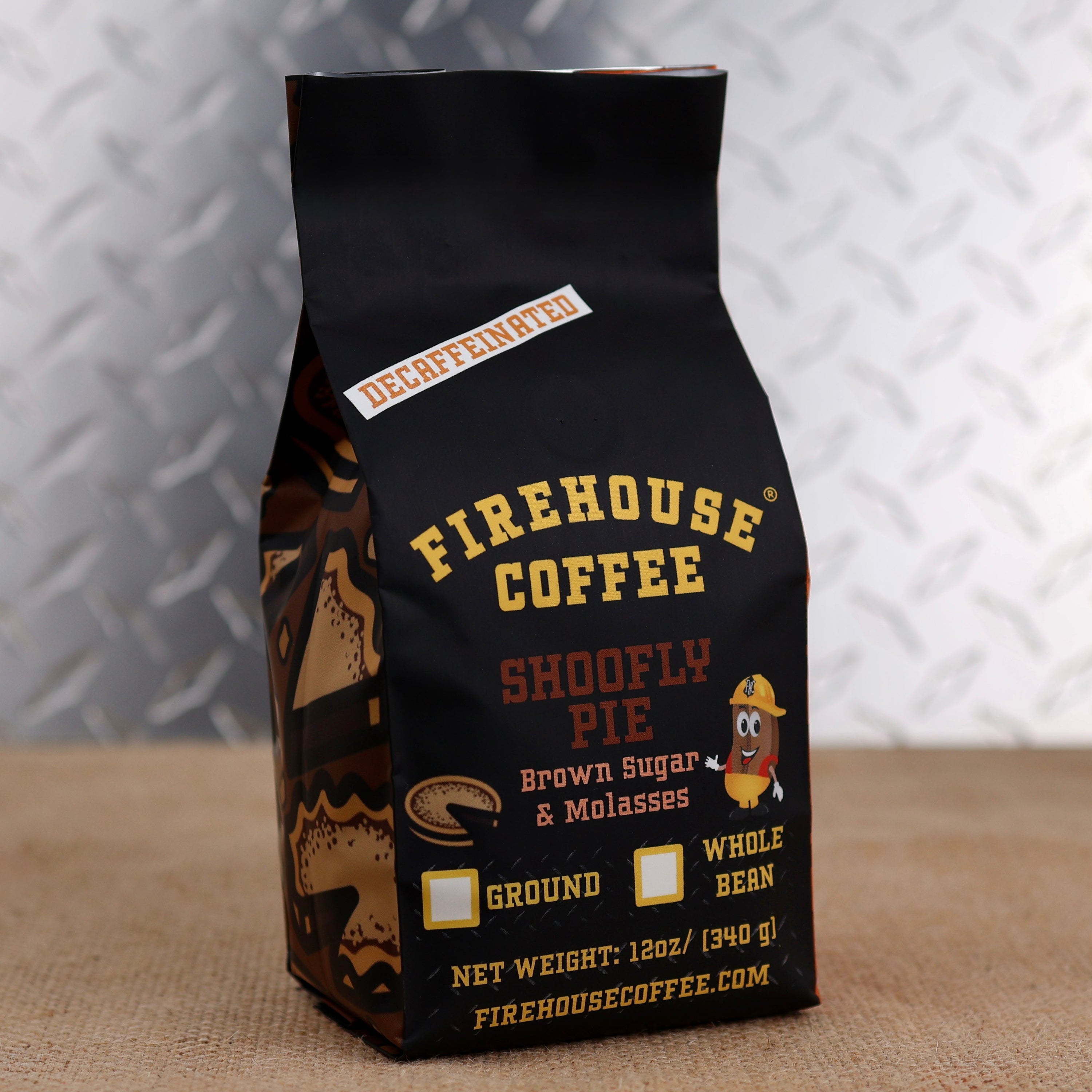 Firehouse Coffee Decaf Shoofly Pie Flavored Coffee 12oz bag featuring rich brown sugar and molasses flavors, Swiss Water Process decaffeinated premium Arabica coffee, freshly roasted in small batches.