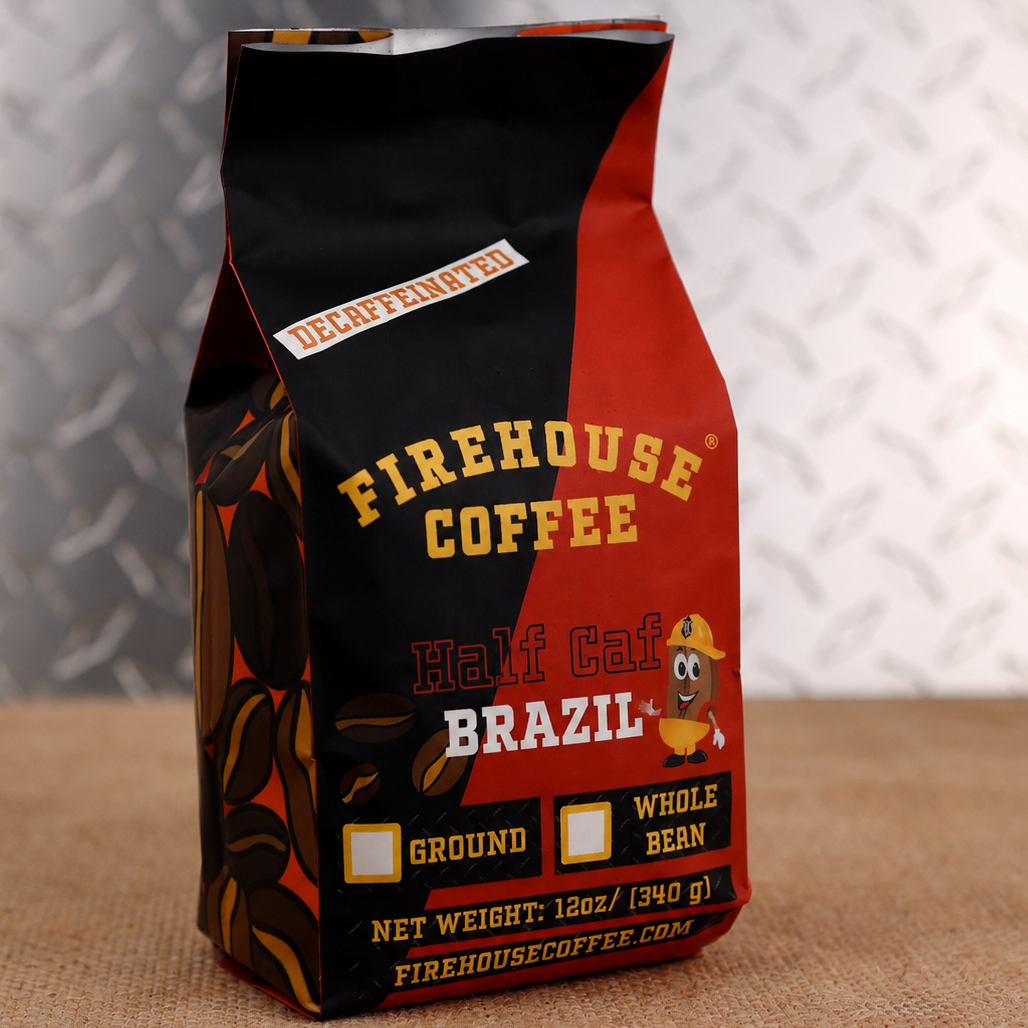 Firehouse Coffee Half Caf Brazil Coffee features a balanced blend of regular and decaffeinated Brazil beans, delivering a smooth medium roast with rich aroma, bright flavor, and half the caffeine. Fresh roasted and available in whole bean or ground.