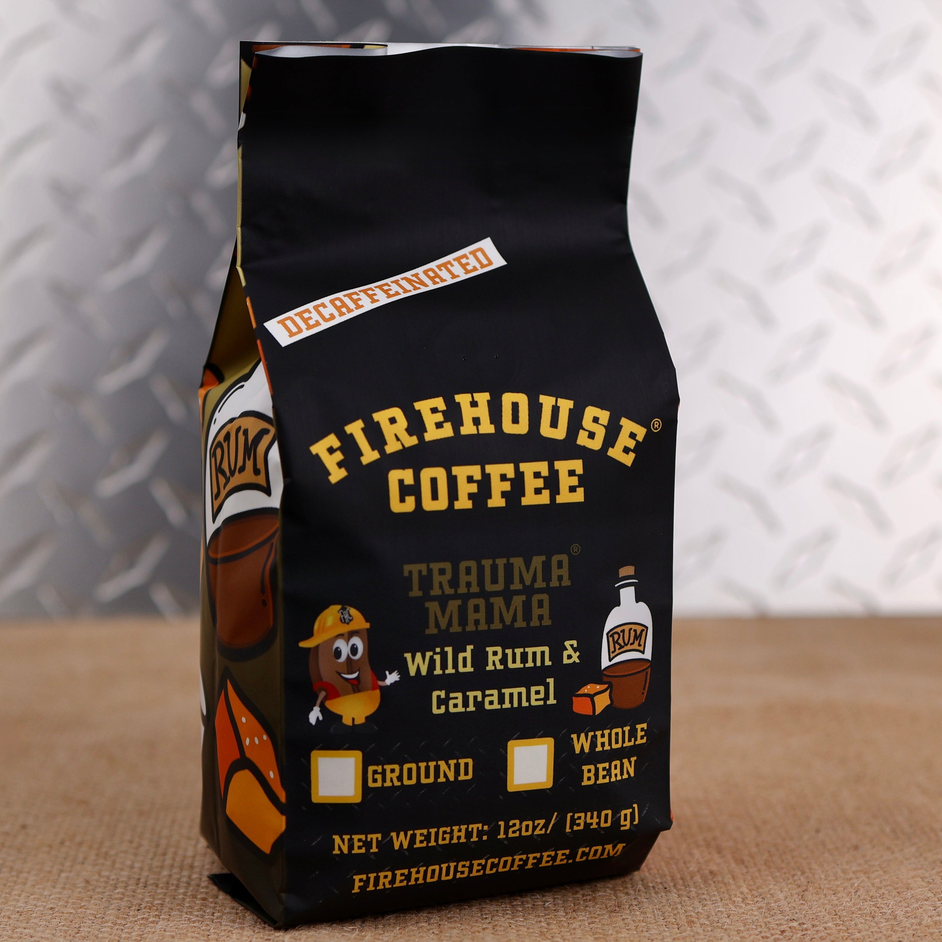 Firehouse Coffee Trauma Mama™ Decaf Wild Rum & Caramel flavored coffee in a 12 oz bag featuring rich wild rum-inspired flavor and buttery caramel. Freshly roasted gourmet decaffeinated coffee available in whole bean or ground.
