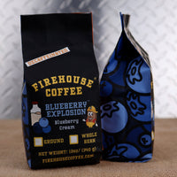 Firehouse Coffee Blueberry Explosion™ Decaf Blueberry Cream flavored coffee in a 12 oz bag featuring sweet blueberry and creamy vanilla flavor. Freshly roasted gourmet decaffeinated coffee available in whole bean or ground for a smooth, dessert-inspired coffee experience.