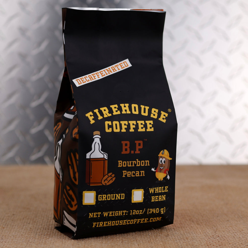 Firehouse Coffee B.P. Decaf Bourbon Pecan coffee in a 12oz bag combines sweet bourbon-inspired notes with rich roasted pecan flavor. Available in freshly roasted whole bean or ground coffee.