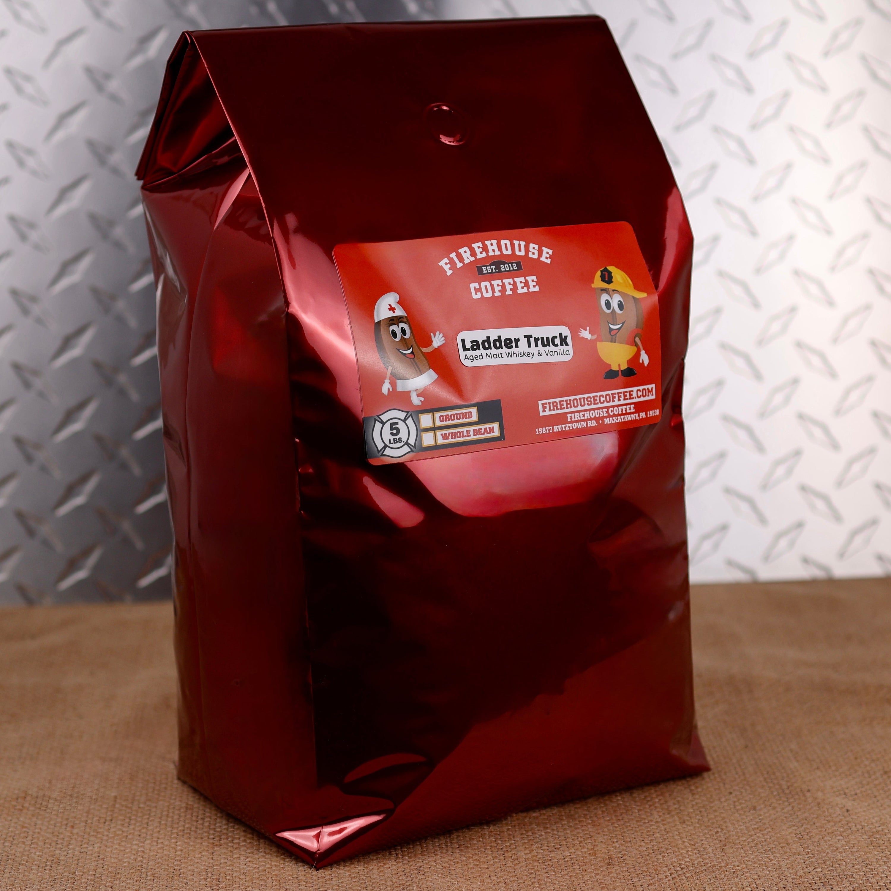Firehouse Coffee Ladder Truck Aged Whiskey & Vanilla Coffee, 5 lb fresh roasted flavored coffee featuring rich aged whiskey notes blended with sweet vanilla. Gourmet coffee available in whole bean or ground for a smooth, bold, and aromatic brewing experience.