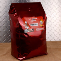 Firehouse Coffee Ruptured Raspberry Chocolate Raspberry Flavored Coffee in a 5 lb bag, freshly roasted gourmet coffee with luscious chocolate, sweet raspberry, and dessert-inspired flavors. Available in whole bean or ground, this premium flavored coffee is perfect for home, office, cafés, restaurants, and coffee lovers searching for chocolate raspberry coffee, raspberry flavored coffee, chocolate coffee, gourmet flavored coffee, and specialty coffee.