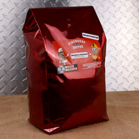 Firehouse Coffee Blueberry Explosion™ Decaf Blueberry Cream flavored coffee in a 5 lb bag featuring ripe blueberry flavor and smooth vanilla cream. Freshly roasted gourmet decaffeinated coffee available in whole bean or ground, ideal for home, office, café, and commercial brewing.