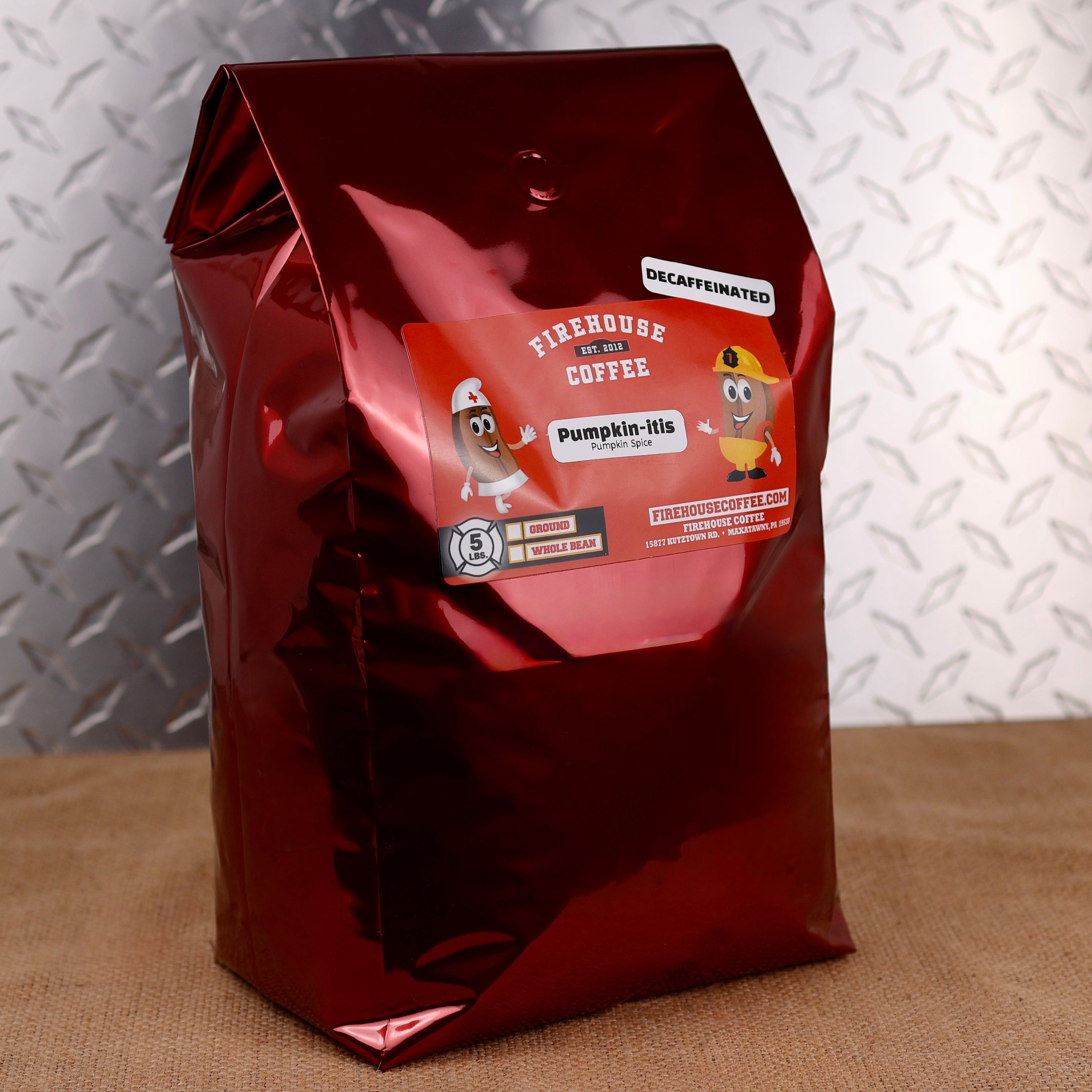 5 lb Firehouse Coffee Decaffeinated Pumpkin-itis Pumpkin Spice flavored coffee featuring premium Arabica beans and Swiss Water Process decaffeination. Rich autumn pumpkin spice flavor available as whole bean or ground coffee.