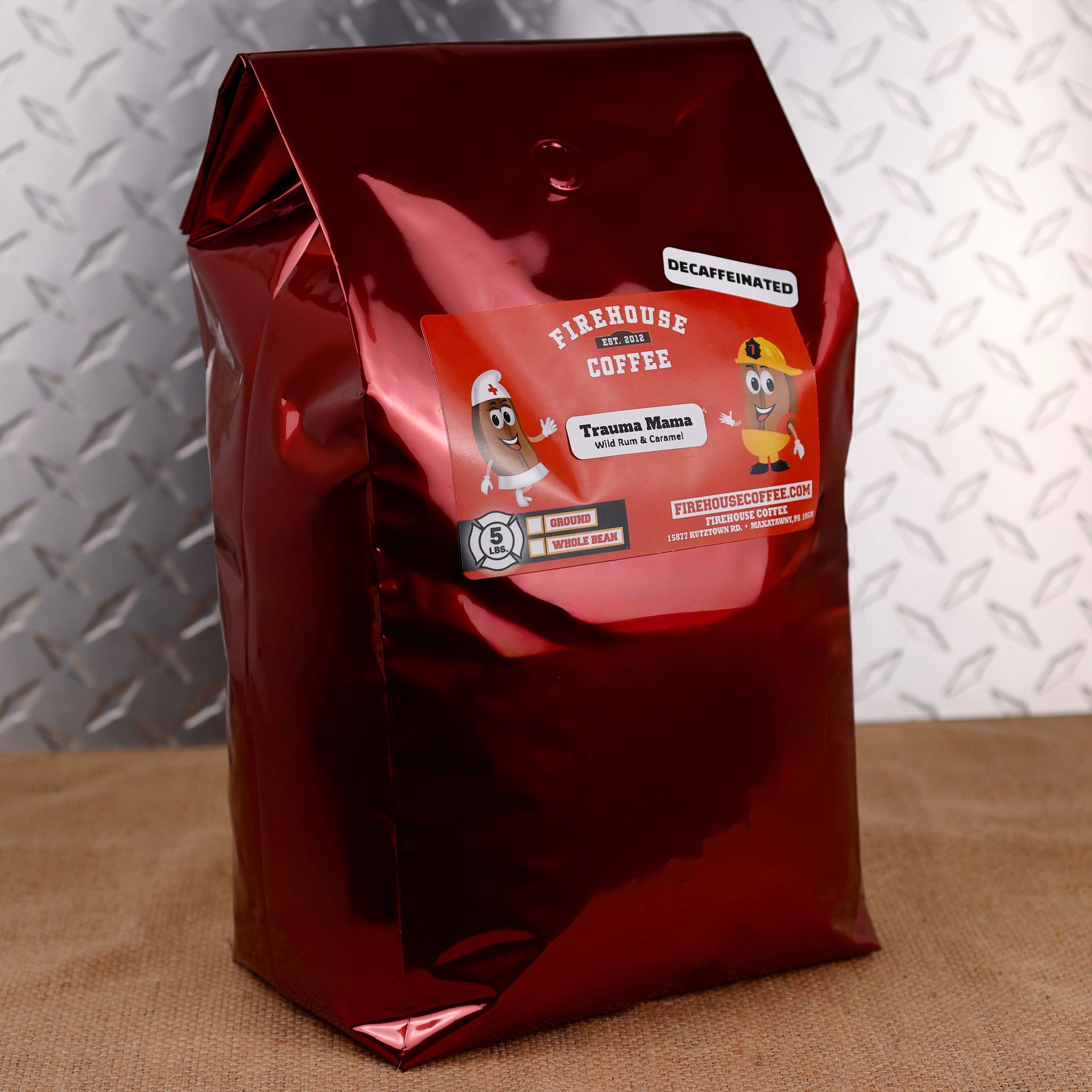 Firehouse Coffee Trauma Mama™ Decaf Wild Rum & Caramel flavored coffee in a 5lb bag with smooth wild rum-inspired and buttery caramel flavor. Freshly roasted gourmet decaffeinated coffee available in whole bean or ground for a rich, dessert-inspired coffee experience.