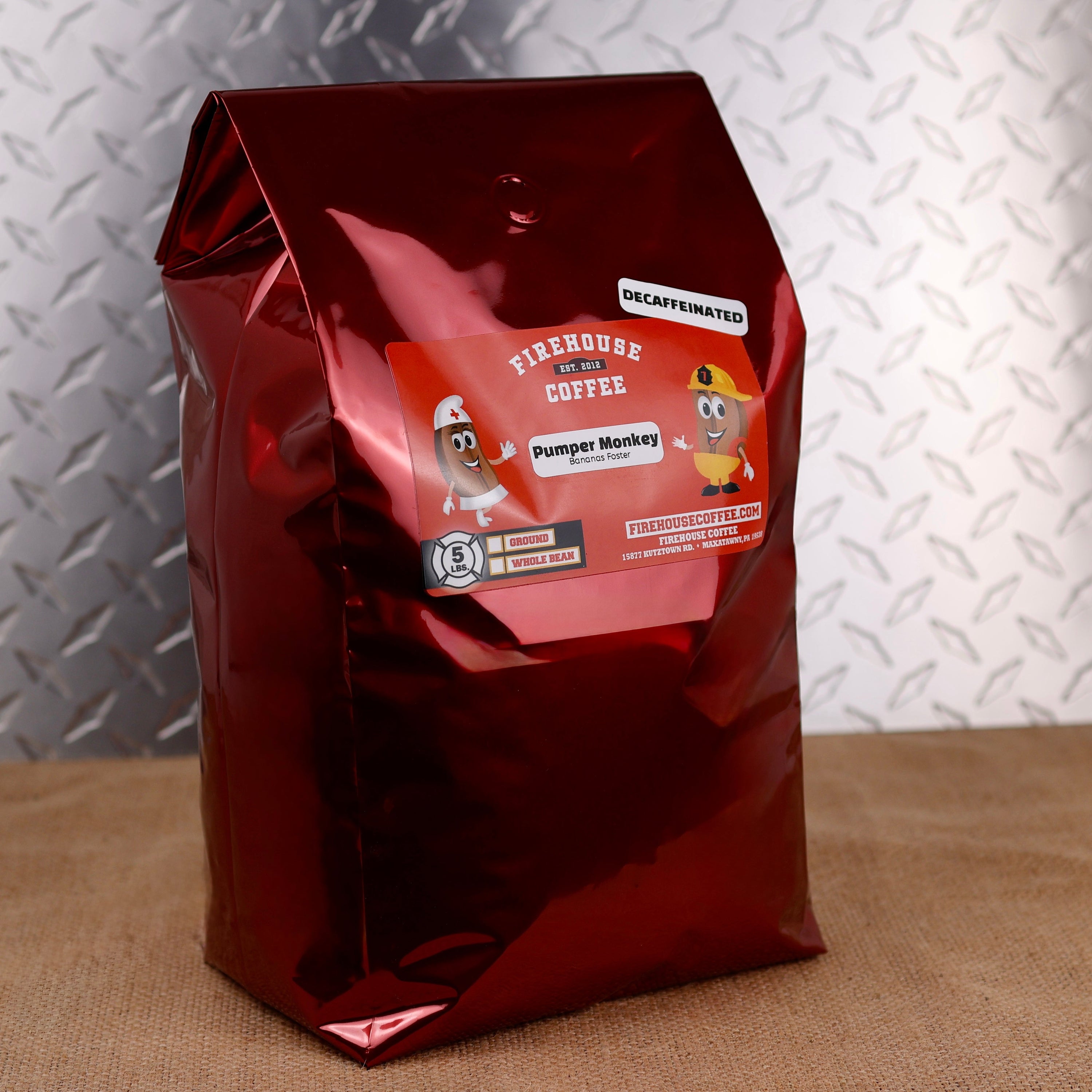 Premium Firehouse Coffee Pumper Monkey Decaf Banana Foster flavored coffee with banana, caramel, and rum-inspired flavor. Freshly roasted gourmet decaf coffee in whole bean or ground.