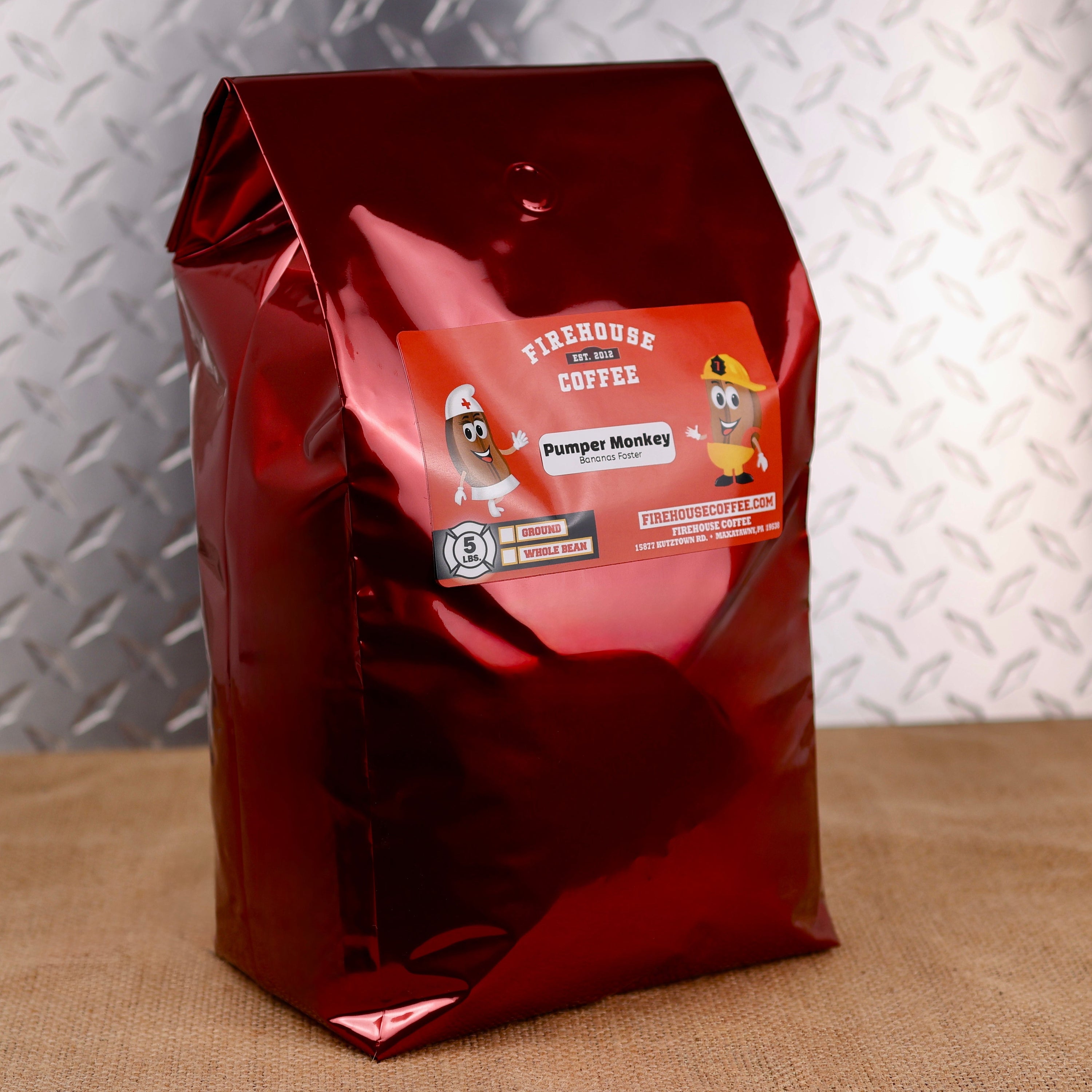 Pumper Monkey™ 5 lb Banana Foster Flavored Coffee bag by Firehouse Coffee featuring freshly roasted premium Arabica coffee with banana, buttery caramel, cinnamon, vanilla, and rum flavor, available in whole bean or ground.