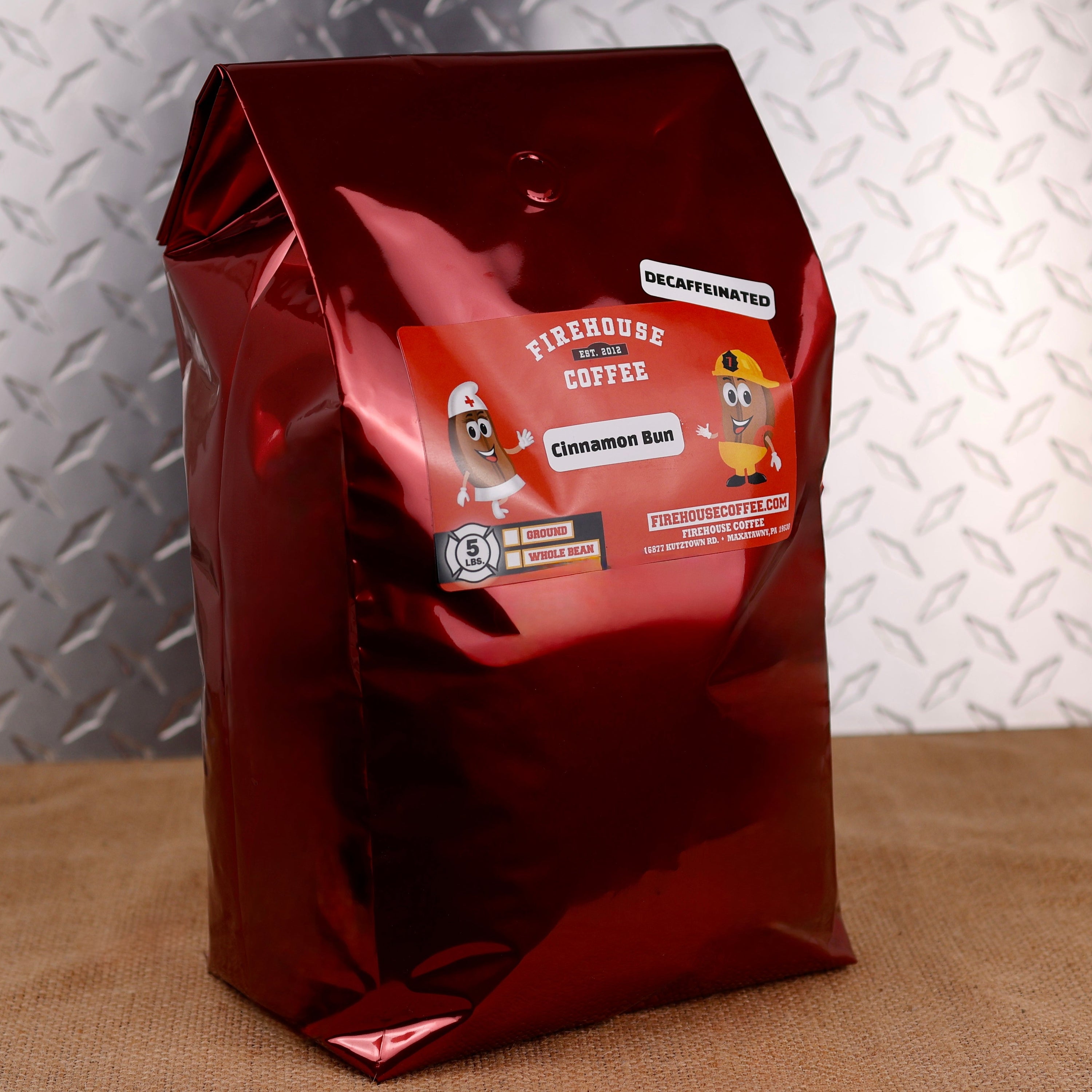 Firehouse Coffee Decaf Cinnamon Roll coffee made with premium 100% Arabica beans, naturally decaffeinated using the Swiss Water Process, offering rich cinnamon, buttery pastry, and creamy vanilla icing flavors.