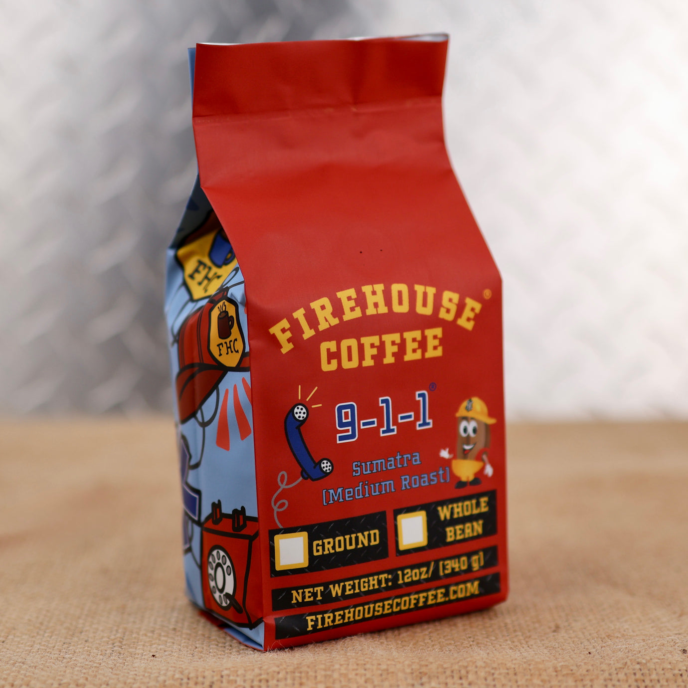 911 Coffee is a Sumatra Medium Roast with a design of a telephone, star of life, fire helmet, and police badge