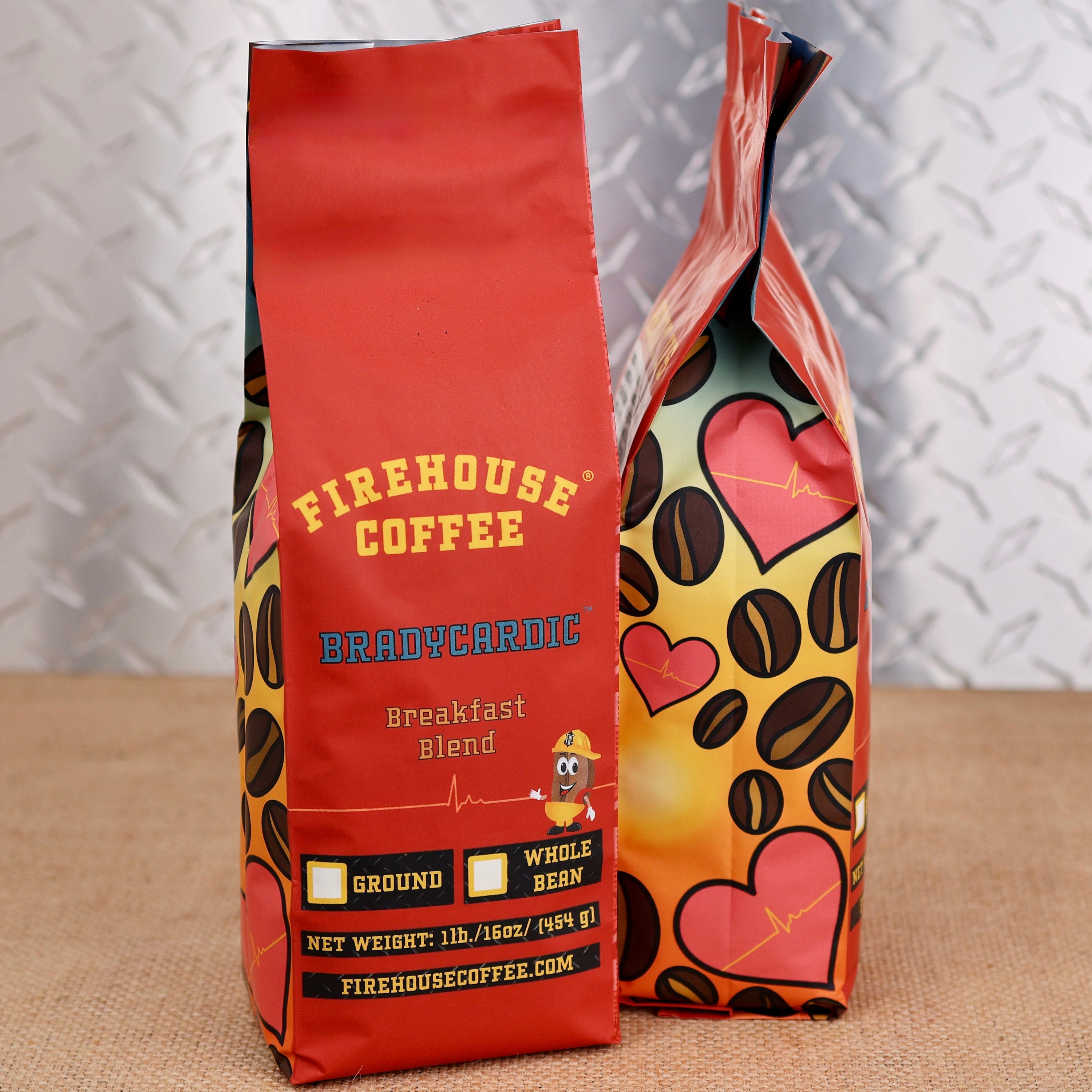 Firehouse Coffee Bradycardic Breakfast Blend 1 lb coffee bags featuring a firefighter-themed red package with coffee beans, heart graphics, and EKG design.