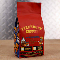 Firehouse Coffee Captain Caramel gourmet flavored coffee with buttery caramel and rum crème brûlée flavor in a 12oz bag, available as whole bean or ground.