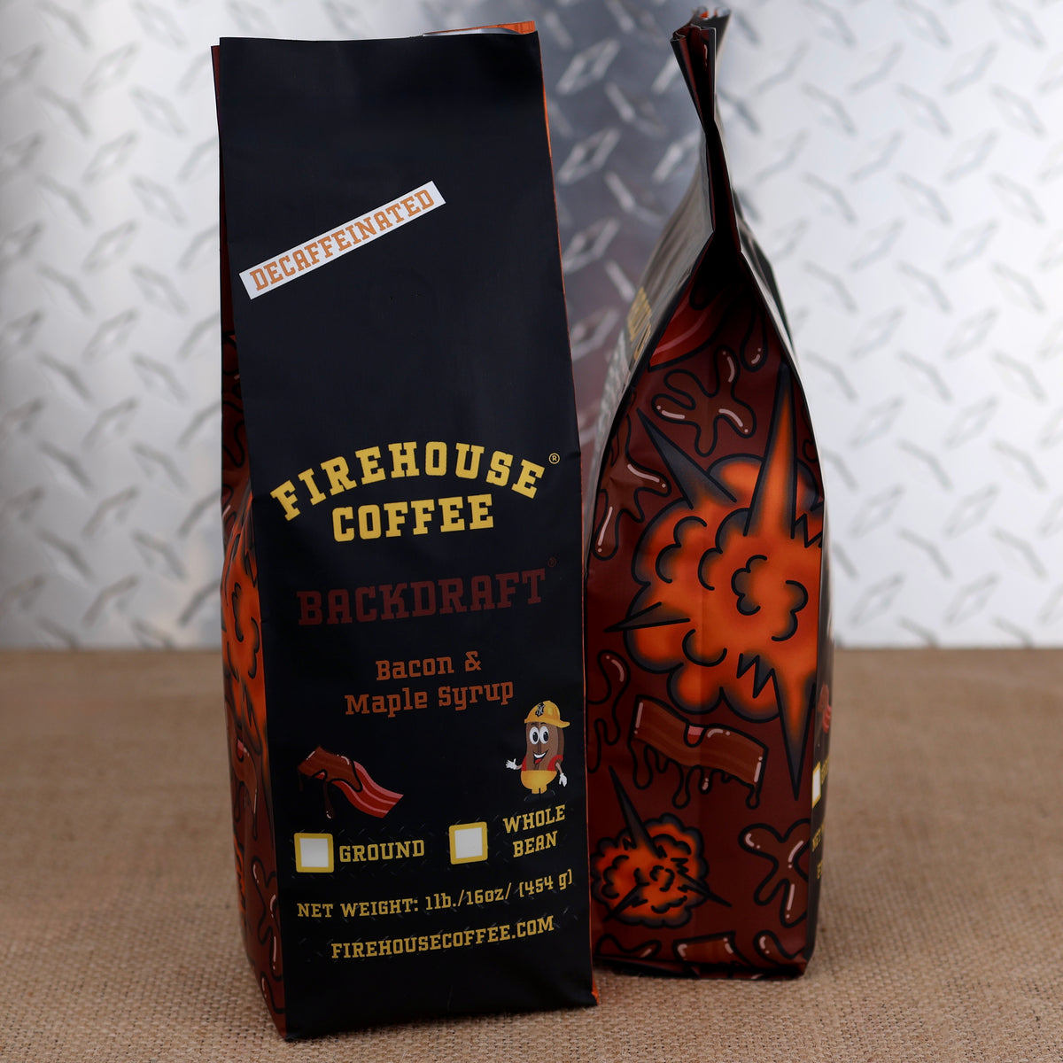 A decaffeinated bag of Firehouse Coffee Backdraft flavor next to a bag displaying its fire and bacon side pattern.