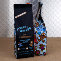 Firehouse Coffee Dr. Gingerbread Gingerbread Cookie Decaffeinated 1lb bag, showing checkboxes for ground or whole bean and side panels with illustrated first responder gingerbread characters.