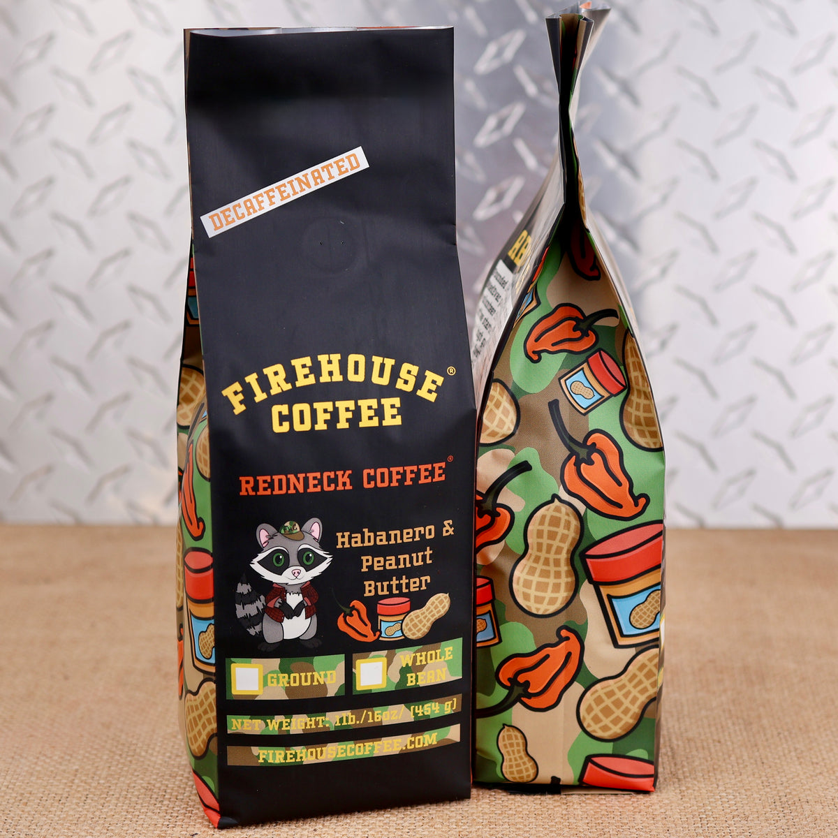Two 1 lb bags of Firehouse Coffee Redneck Coffee® Habanero & Peanut Butter Decaf, showing the front label and camouflage side design.