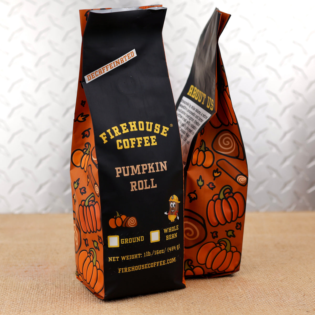 Firehouse Coffee decaf pumpkin roll flavored coffee in 1 lb bags with orange pumpkin and cake roll artwork