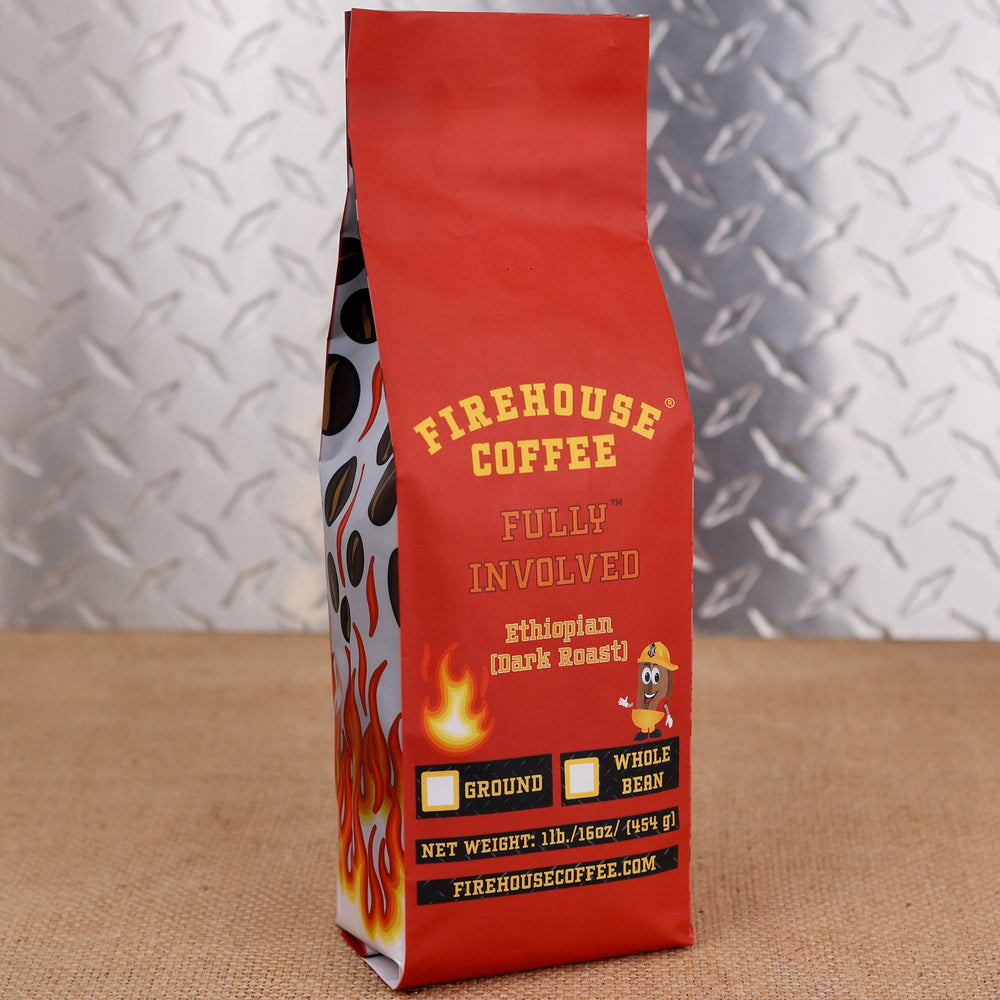 Firehouse Coffee Fully Involved Ethiopian Dark Roast 1 lb whole bean or ground coffee, featuring a rich dark roast in distinctive flame-covered firefighter-inspired packaging.