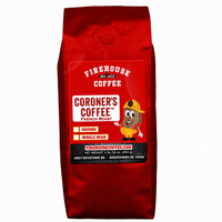 Firehouse Coffee Coroner's Blend French Roast Coffee in a matte black bag featuring a coroner-themed illustration and Firehouse Coffee branding. Available in whole bean or ground, this bold French roast offers a rich, smoky flavor with deep roasted notes and a full-bodied finish for dark roast coffee lovers.