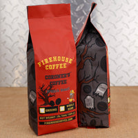 Firehouse Coffee Coroner’s Coffee French Roast 1 lb dark roast coffee bag featuring bold red and black packaging with coffee beans and graveyard-inspired artwork.