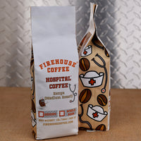 Firehouse Coffee Hospital Coffee Kenya medium roast coffee 1 lb bag with nurse cap, stethoscope and coffee bean artwork, available ground or whole bean.