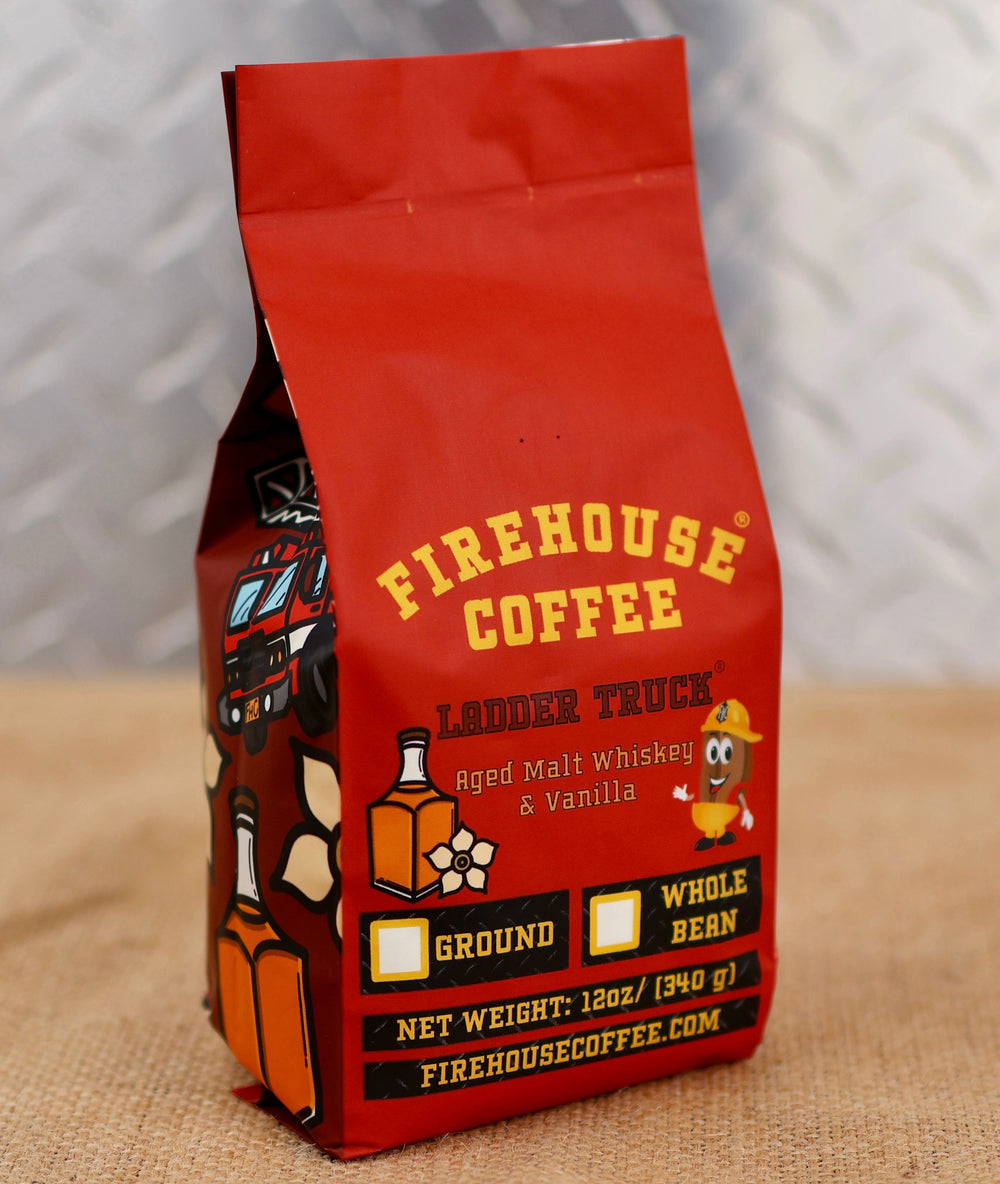 Ladder Truck® is an Aged Whiskey and Vanilla Coffee by Firehouse Coffee.  The packaging shows a bottle of whiskey and a ladder fire truck.