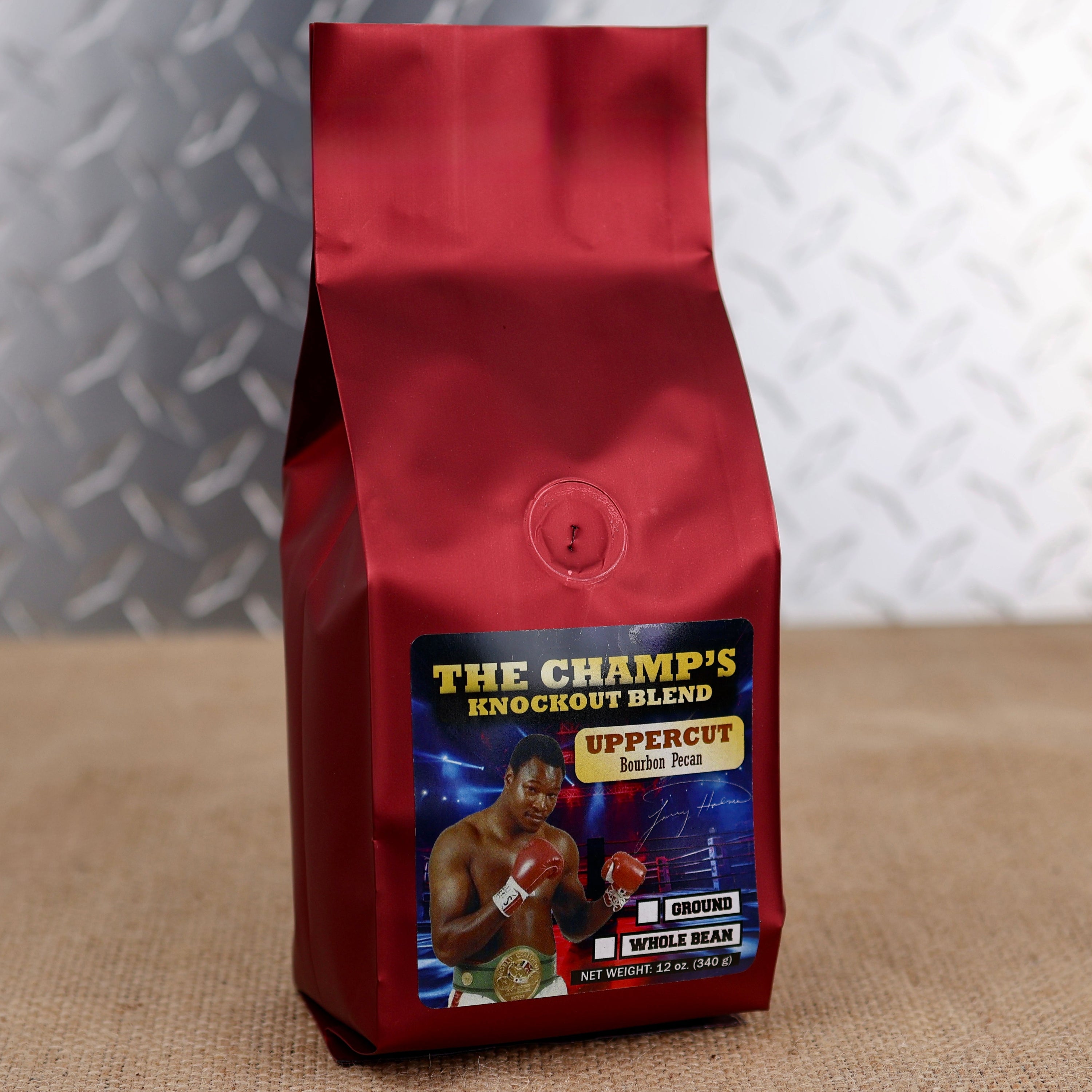 Firehouse Coffee Larry HolmesUpper Cut Bourbon Pecan flavored coffee comes in a premium 12 oz bag, available in whole bean or ground coffee with smooth bourbon and roasted pecan flavor.