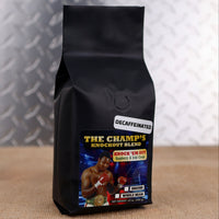 Larry Holmes Knock 'Em Out Blend by Firehouse Coffee featuring Decaf Rum & Raspberry flavored coffee with creamy Irish cream and ripe raspberry notes, available in whole bean or ground.