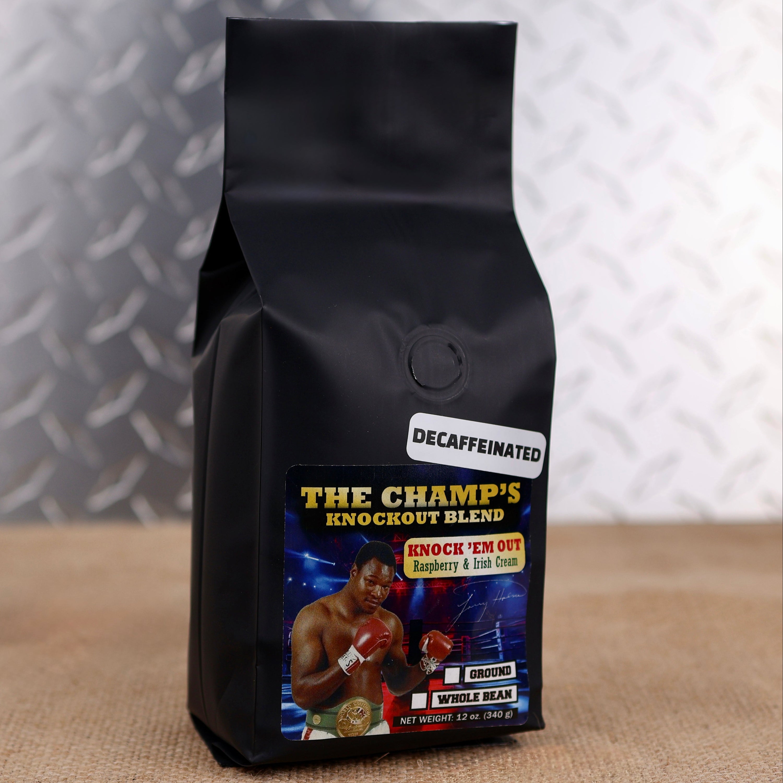 Larry Holmes Knock 'Em Out Blend by Firehouse Coffee featuring Decaf Rum & Raspberry flavored coffee with creamy Irish cream and ripe raspberry notes, available in whole bean or ground.