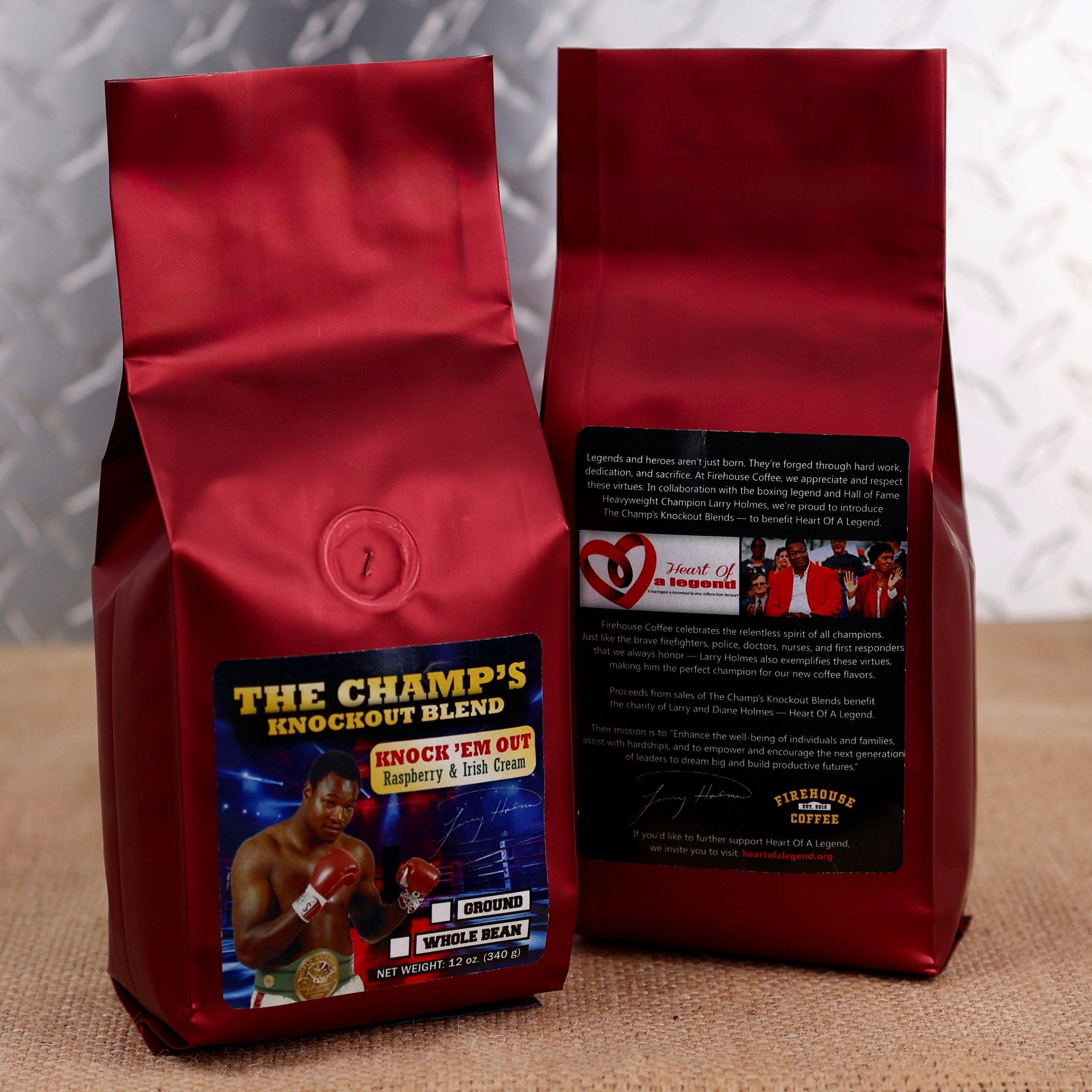 Firehouse Coffee Larry Holmes Knock 'Em Out Blend Rum & Raspberry flavored coffee featuring boxing legend Larry Holmes on the label, available in whole bean or ground in a 12 oz bag.
