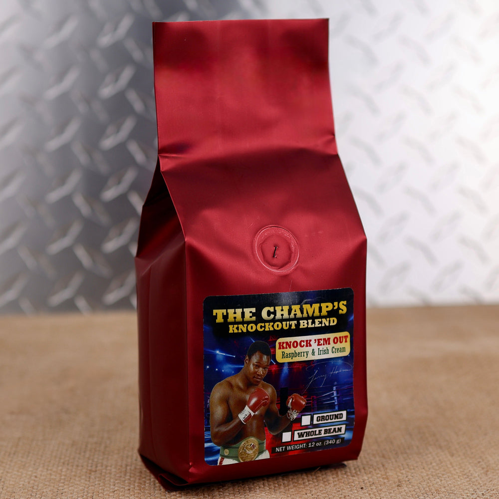 Larry Holmes Knock 'Em Out Blend by Firehouse Coffee featuring Rum & Raspberry flavored coffee with creamy Irish cream and ripe raspberry notes, available in whole bean or ground.