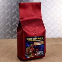 Larry Holmes Knock 'Em Out Blend by Firehouse Coffee featuring Rum & Raspberry flavored coffee with creamy Irish cream and ripe raspberry notes, available in whole bean or ground.