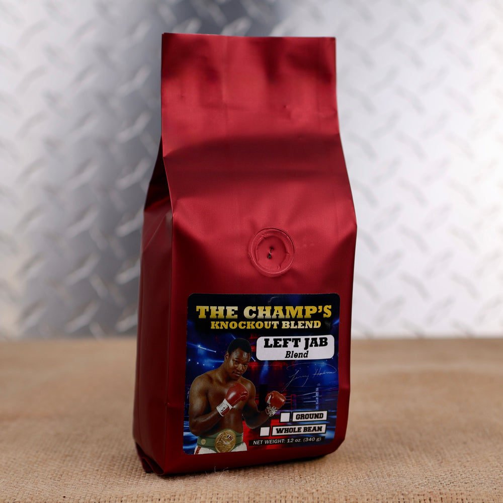 Firehouse Coffee Larry Holmes Left Jab Blend premium coffee in a 12 oz bag, available in whole bean or ground, featuring boxing legend Larry Holmes and a bold, smooth signature roast.