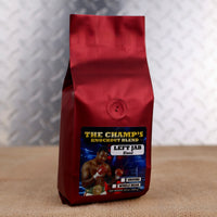 Firehouse Coffee Larry Holmes Left Jab Blend premium coffee in a 12 oz bag, available in whole bean or ground, featuring boxing legend Larry Holmes and a bold, smooth signature roast.