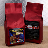 Firehouse Coffee Larry Holmes Upper Cut Bourbon Pecan flavored coffee in a premium 12 oz bag, available in whole bean or ground coffee with smooth bourbon and roasted pecan flavor.