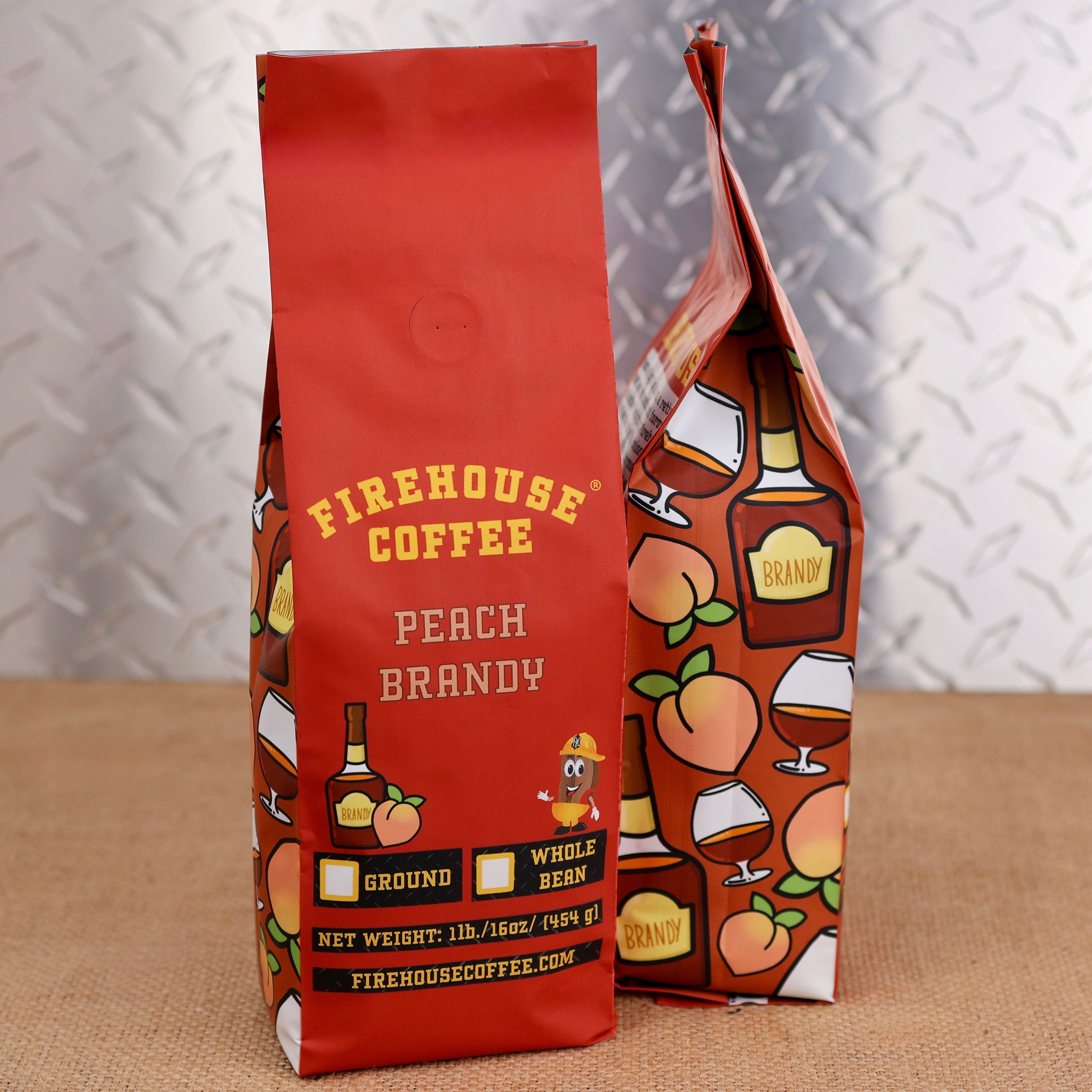 Firehouse Coffee Peach Brandy flavored coffee in a 1 lb bag, available ground or whole bean, featuring sweet peach and brandy flavor.