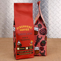 Firehouse Coffee Rescue Rum Rum & Raspberry flavored coffee in a 1 lb bag, available ground or whole bean, featuring rich rum and raspberry flavor.