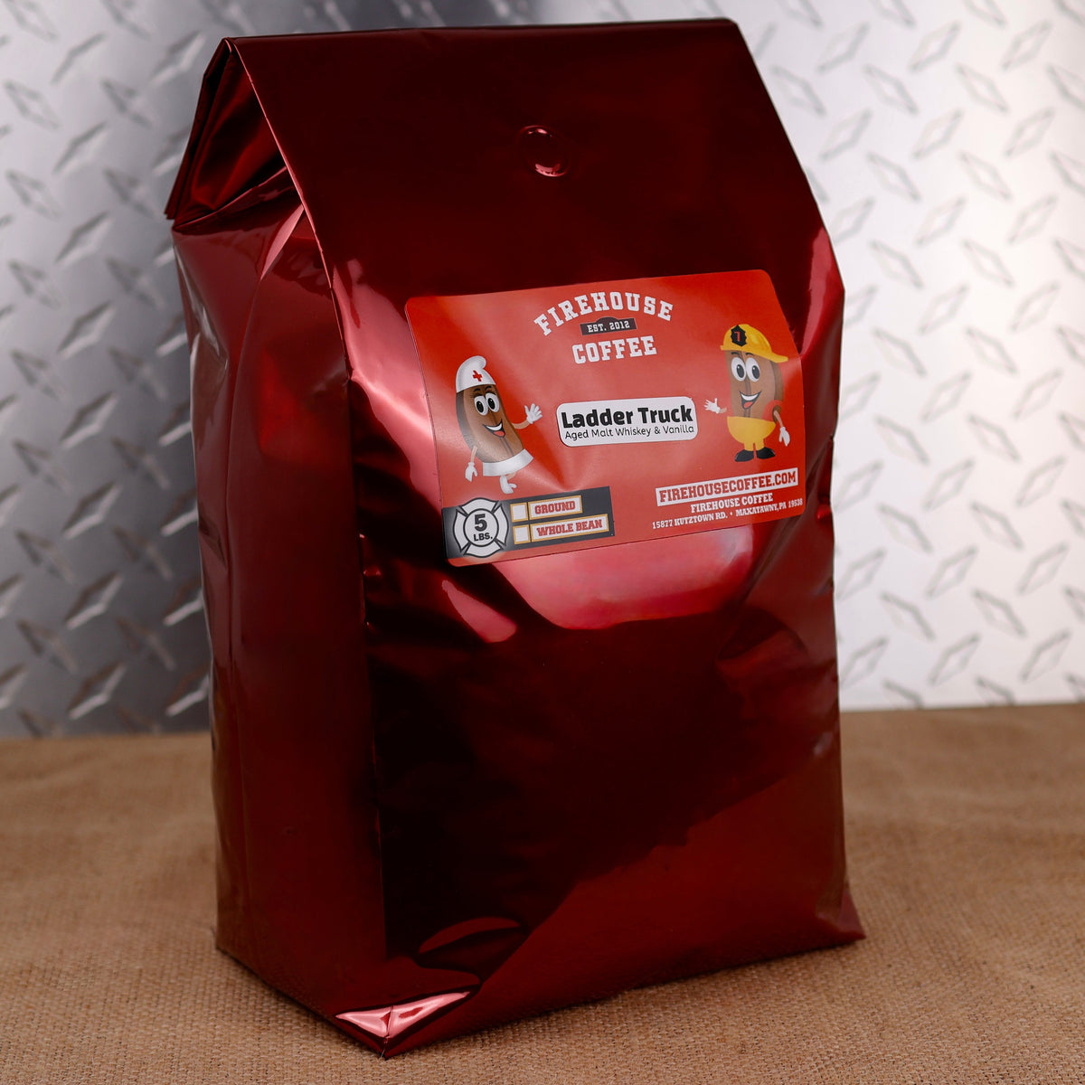 Firehouse Coffee Ladder Truck Aged Whiskey & Vanilla Coffee, 5 lb fresh roasted flavored coffee featuring rich aged whiskey notes blended with sweet vanilla. Gourmet coffee available in whole bean or ground for a smooth, bold, and aromatic brewing experience.