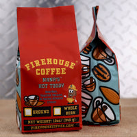 Firehouse Coffee Nana's Hot Toddy bourbon, toasted pecans, and Swiss almond cream flavored coffee packaged in Firehouse Coffee's signature firefighter-inspired design.