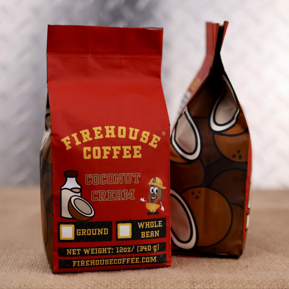 Firehouse Coffee Coconut Cream coffee bags shown from front and side angles, featuring red branded packaging with coconut imagery, hazard-style design accents, and 12oz ground and whole bean options.